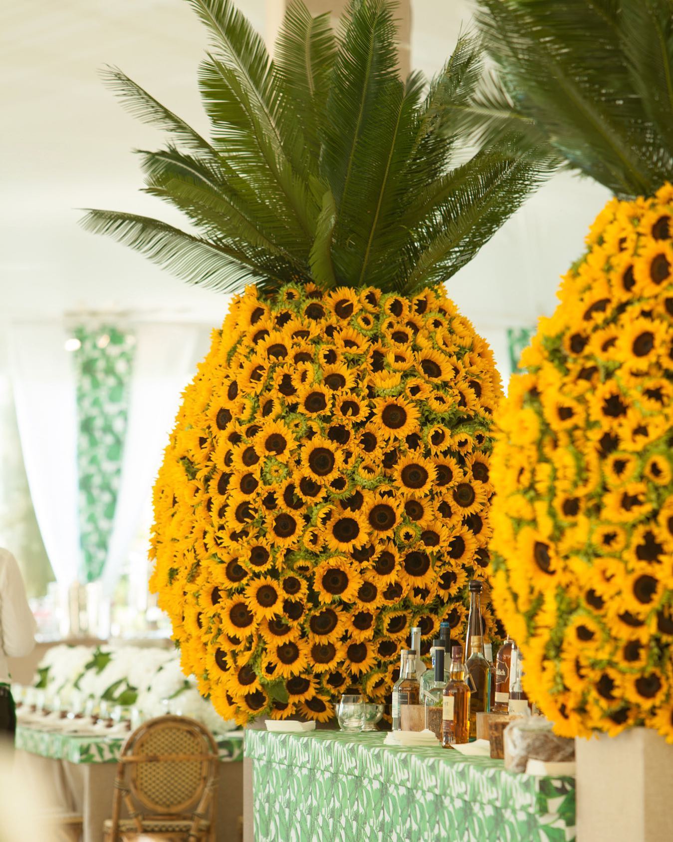 Pineapples represent hospitality and symbolize a warm welcome #NormaCohen Flowers & Linens: Birch Event Design Lighting: Pegasus parties and productions Chairs: Luxe Event Rentals ... Catering: Foremost Cakes and Catering Services Photo + Video: Fred Marcus StudioTent: Almar Party & Tent Rentals See more